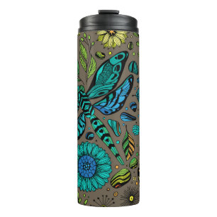 Vlieg, vlieg dragonvlieg op bruin thermosbeker