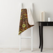 Vliegen, dragonvlieg op kannamonbruin sherpa deken (In situ)