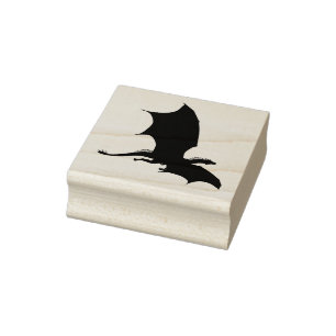 Vliegende draak zwarte silhouetvorm rubberstempel