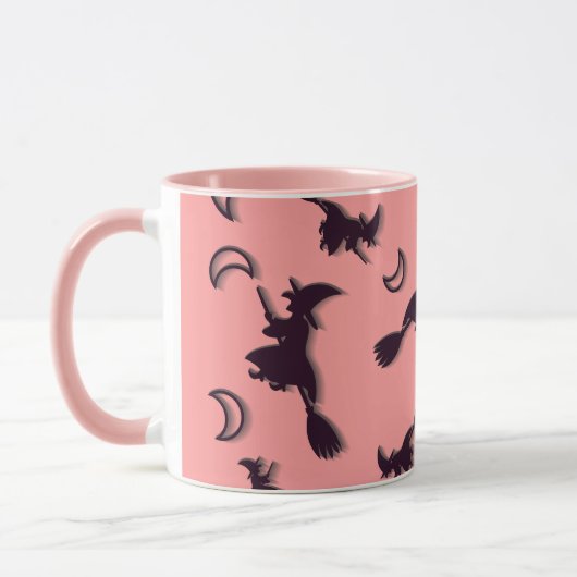 Vliegende heks tussen halve maan bij Halloween nac Mok (Links)