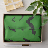 Vliegende vleermuizen op groen tissuepapier (Geschenk)