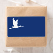 Vliegende witte ooievaar etiket (Insitu)