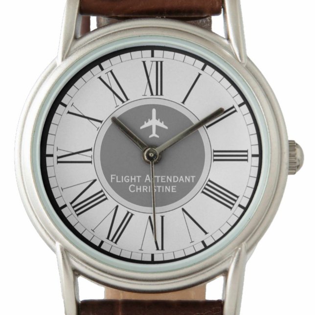 Vliegtuig begeleidende cabinepersoneel volgen horloge (Creator heeft geüpload)