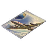 vliegtuig dat over de hele wereld in wolken vlieg notitieboek (Linkerzijde)