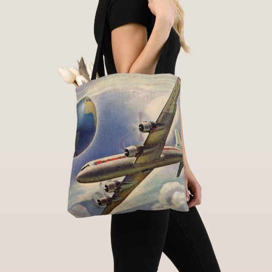  vliegtuig dat over de hele wereld in wolken vlieg tote bag (Dichtbij)