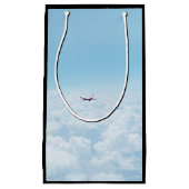 Vliegtuig dat wordt geacht, een vliegtuig vliegt i klein cadeauzakje (Voorkant)