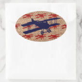 Vliegtuig met propeller op schoot ovale sticker (Tas)