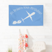 Vliegtuig op blauw gepersonaliseerd spandoek (Insitu)