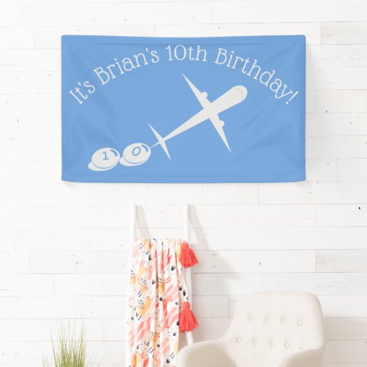 Vliegtuig op blauw gepersonaliseerd spandoek (Insitu)