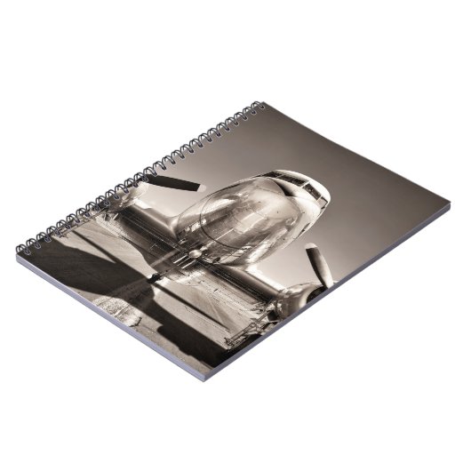  vliegtuig op een baan notitieboek (Linkerzijde)