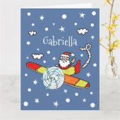 Vliegtuig voor kerstkerstkerstmis met een persoonl kaart (Gele Bloem)