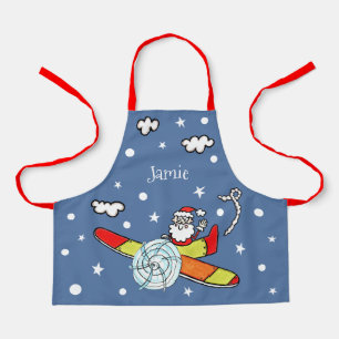 Vliegtuig voor kerstkerstkerstmis met een persoonl schort