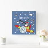 Vliegtuig voor kerstkerstkerstmis met een persoonl vierkante klok (Huis)