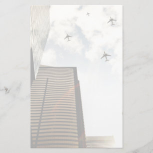 Vliegtuigen boven gebouwen briefpapier