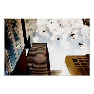 Vliegtuigen boven gebouwen poster