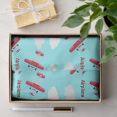 Vliegtuigpatroon op blauw tissuepapier (Geschenk)