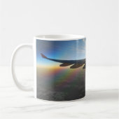 Vliegtuigvleugel tegen Mok ondergaande zon (Links)