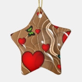 Vlinder en goud keramisch ornament (Links)