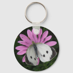 Vlinder en roze bloem sleutelhanger