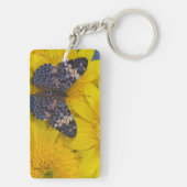 Vlinder op een Gele Bloem Sleutelhanger (achterkant)