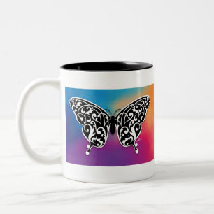 Vlinderontwerp met kleuren van de zonsondergang tweekleurige koffiemok