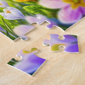 Vlinders boven een bloeiende lentewide legpuzzel (Zijkant)