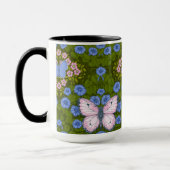 Vlinders en bloemen symmetrie, blauw en roze mok (Links)