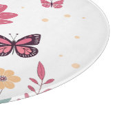 Vlinders met roze tulpen en gele madeliefjes snijplank (Hoek)