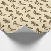 vlinderschets, chocoladebruin op beige cadeaupapier (Hoek)