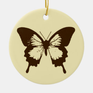 vlinderschets, chocoladebruin op beige keramisch ornament