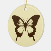 vlinderschets, chocoladebruin op beige keramisch ornament (Links)