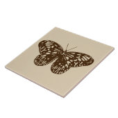 vlinderschets, chocoladebruin op beige tegeltje (Zijkant)