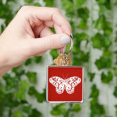 Vlinderschets, diep rood en wit sleutelhanger (Hand)