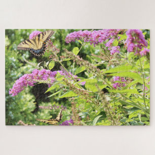 Vlinderstaarten op de struik van de vlinder legpuzzel