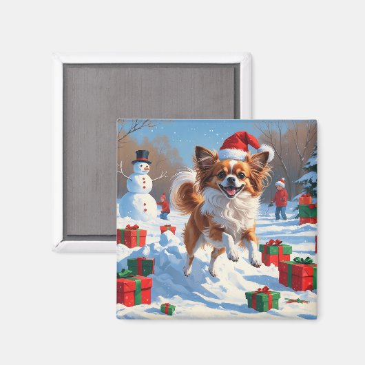 Vlindervlindhond loopt in de sneeuw met kerstmuts magneet (Voorkant / Achterkant)