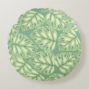 Vloeibaar oerwoud in pastelgroen rond kussen