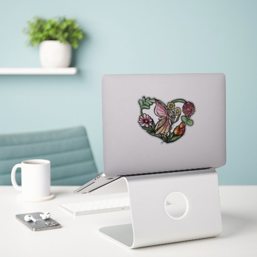 Vloeiende feiries sticker (Laptop op bureau)