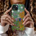 Vloertuin | Gustav Klimt iPhone 15 Case<br><div class="desc">Bloemtuin (1905-1907) door de Oostenrijkse kunstenaar Gustav Klimt. Oorspronkelijk kunstschilderij is olie op doek met een helder abstract landschap van kleurrijke bloemen. Gebruik de ontwerphulpmiddelen om douanetekst toe te voegen of het afbeelding te personaliseren.</div>