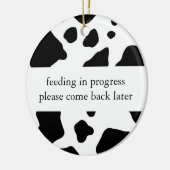 Voeding in opgaande kleerhanger keramisch ornament (Links)