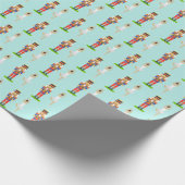 Voedingskraker en balletdanser op licht blauwgroen cadeaupapier (Hoek)