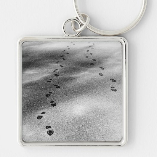 Voetafdrukken in sneeuw sleutelhanger (Voorkant)