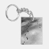 Voetafdrukken in sneeuw sleutelhanger (Voorkant Links)