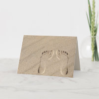 Voetafdrukken in strandzand Verjaardag