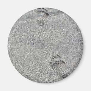 voetafdrukken in zand magneet