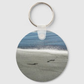 voetafdrukken in zand sleutelhanger (Voorkant)