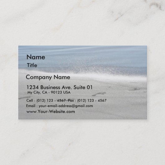 voetafdrukken in zand visitekaartje (Voorkant)