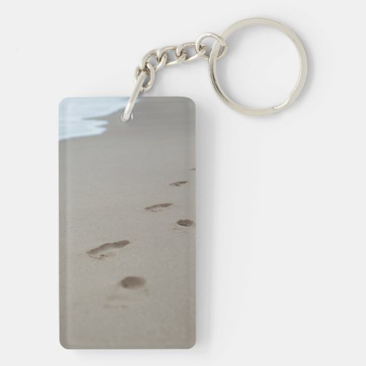 Voetafdrukken op een Mozambikaans strand Sleutelhanger (achterkant)
