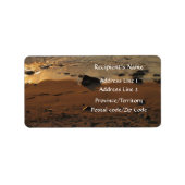 Voetafdrukken op het strand etiket (Voorkant)