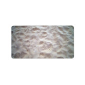 Voetafdrukken op zandtextuur etiket (Voorkant)