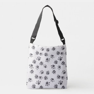 Voetafdrukken van poot: Hond monochroom naadloos. Crossbody Tas